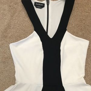 Bebe Black & white Peplum Top XS